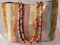 mixed-fabric-rajasthani-bags-250x250